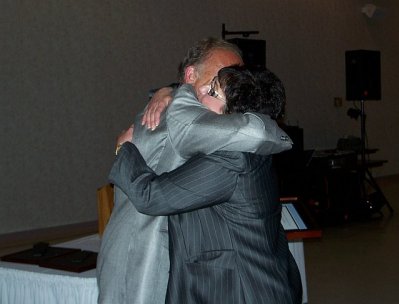 Robin receiving congrats at dinner...